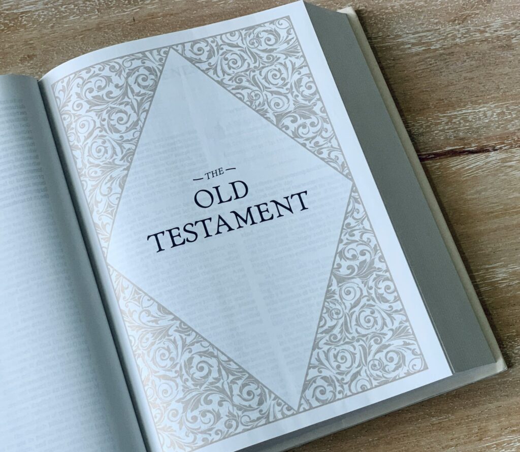 An open Bible displaying the page titled “The Old Testament,” representing the beginning of chronological Bible reading and study of God’s covenant and promises.